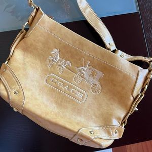 BRAND NEW coach purse with logo and real leather